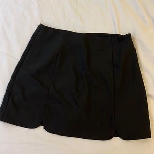 Black scalloped mini skirt
